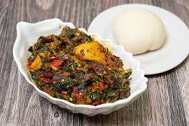 Vegetable soup, swallow with Goatmeat